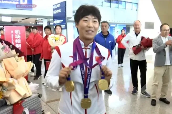 王莉是亞運會三金得主。