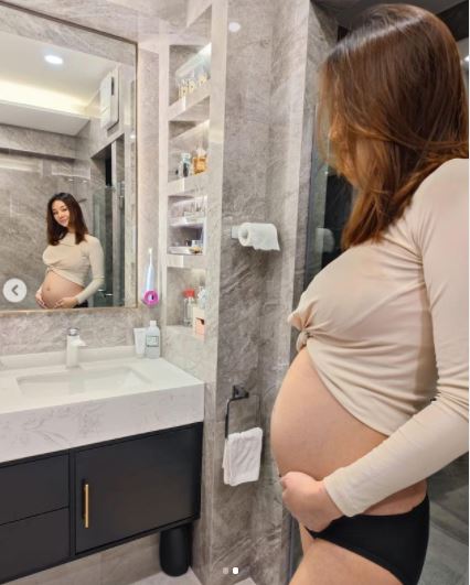 Grace指肚子愈來愈大，囡囡也意識到自己快做姐姐。