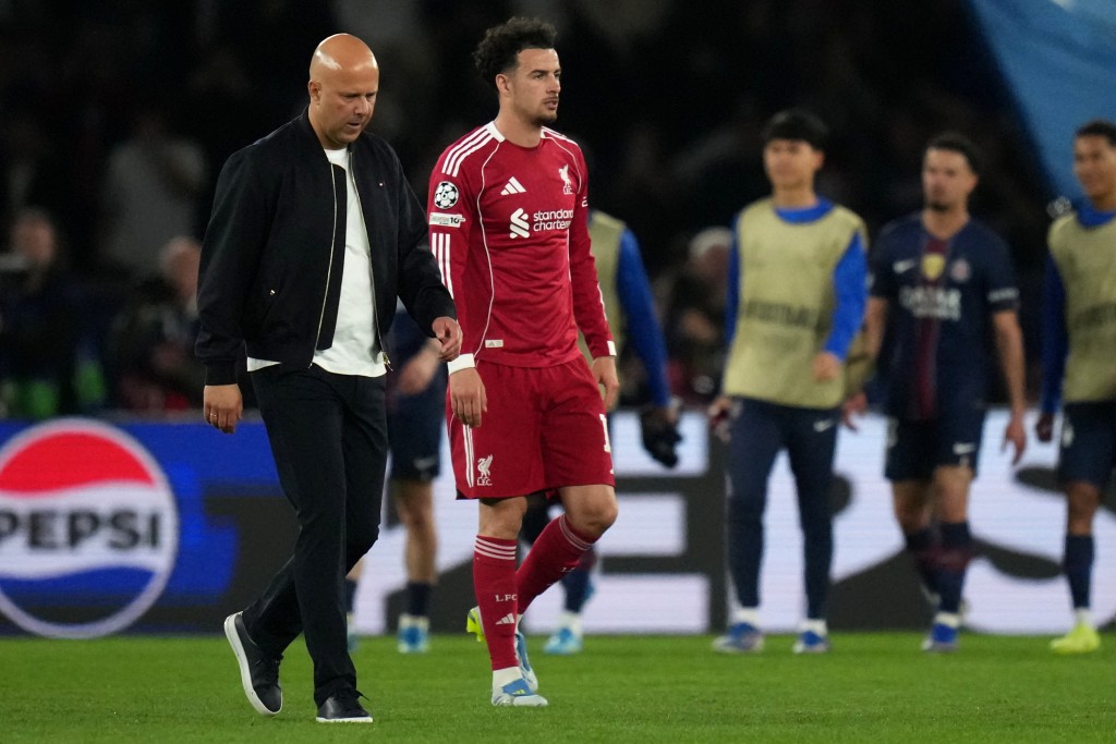 史洛特(左)將利物浦變成一支沒有激情的球隊。美聯社