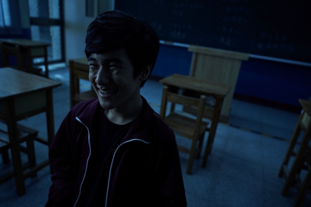 「小光」笑得好奸，亦正亦邪咁。
