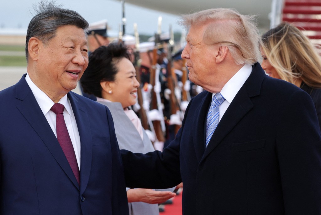 習近平與特朗普交談。路透社