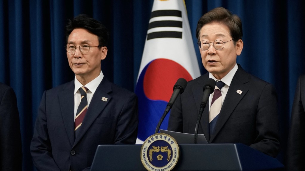 金民錫及南韓總統李在明。 法新社 金民錫及南韓總統李在明。 法新社
