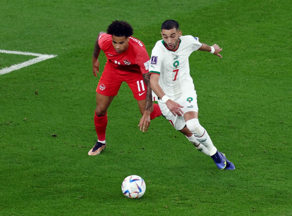 摩洛哥前鋒薛耶治(右)四分鐘為球隊閃電開紀錄。REUTERS
