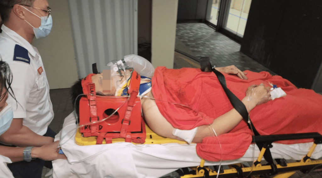坪輋車房七人車唧起維修遭車撞跌 男工下半身被壓逾1小時救出送院。黎志偉攝 坪輋車房七人車唧起維修遭車撞跌 男工下半身被壓逾1小時救出送院。黎志偉攝