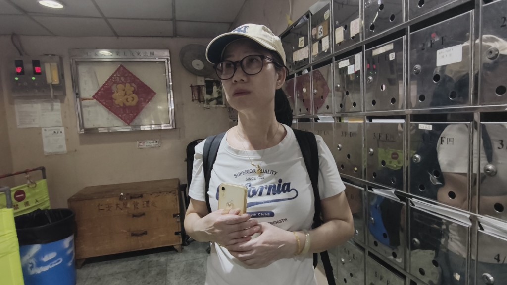 居民陳女士收工回家再遇停電,倍感無奈。 居民陳女士收工回家再遇停電,倍感無奈。