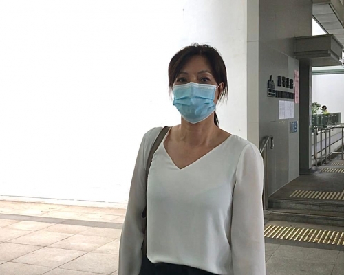 同居女友譚雪梅。資料圖片
