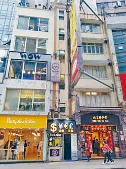 由通利琴行持有的尖區金馬道6號（右）全幢以1.62億沽。