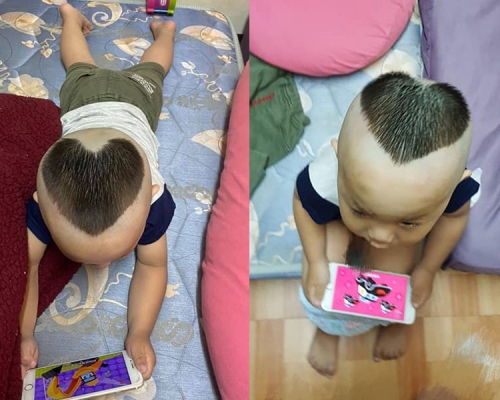 台湾一位妈妈在讨论区分享丈夫躲浴室为子换新发型，表示非常崩溃。(网图)