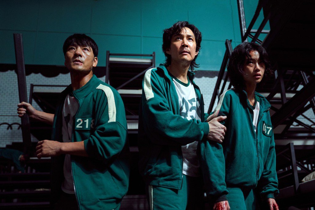 《魷魚遊戲》由李政宰(中)主演。