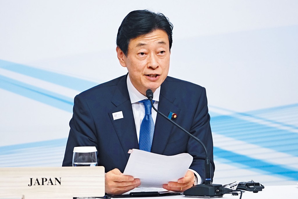 日本經產大臣西村康稔。