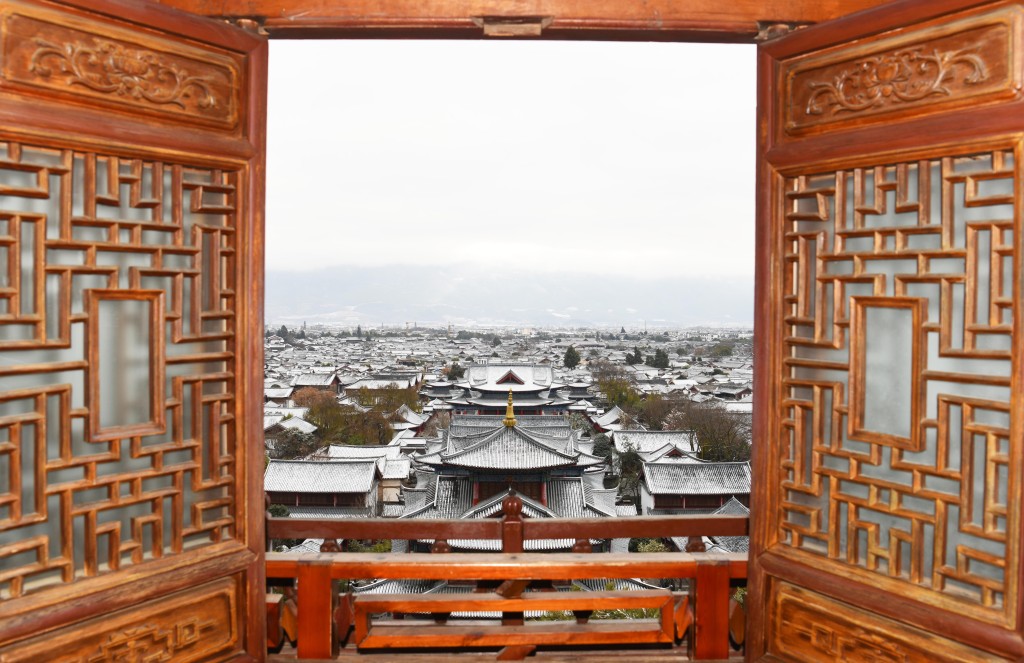 麗江古城雪景。新華社