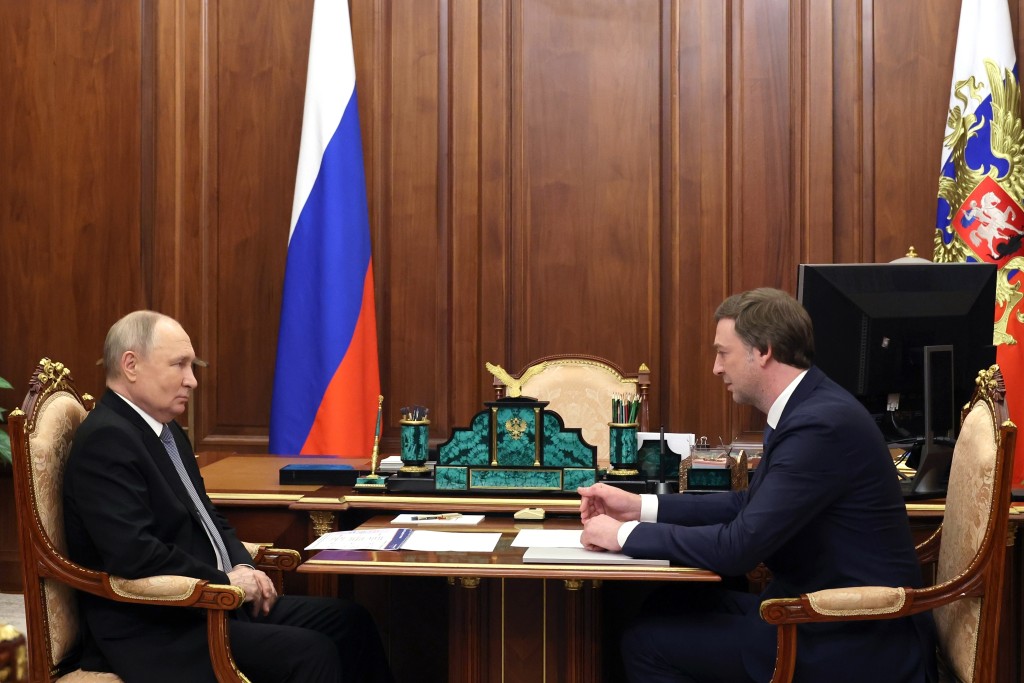 普京日前接见俄航行政总裁亚历山德罗夫斯基。美联社