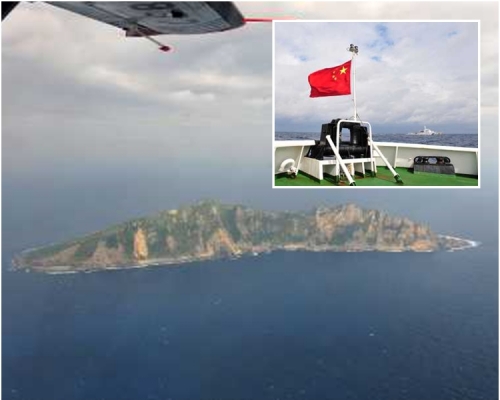 图为飞机上拍摄的钓鱼岛及其附属岛屿画面。资料图片