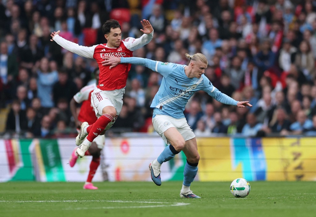 曼城再对阿仙奴。路透社