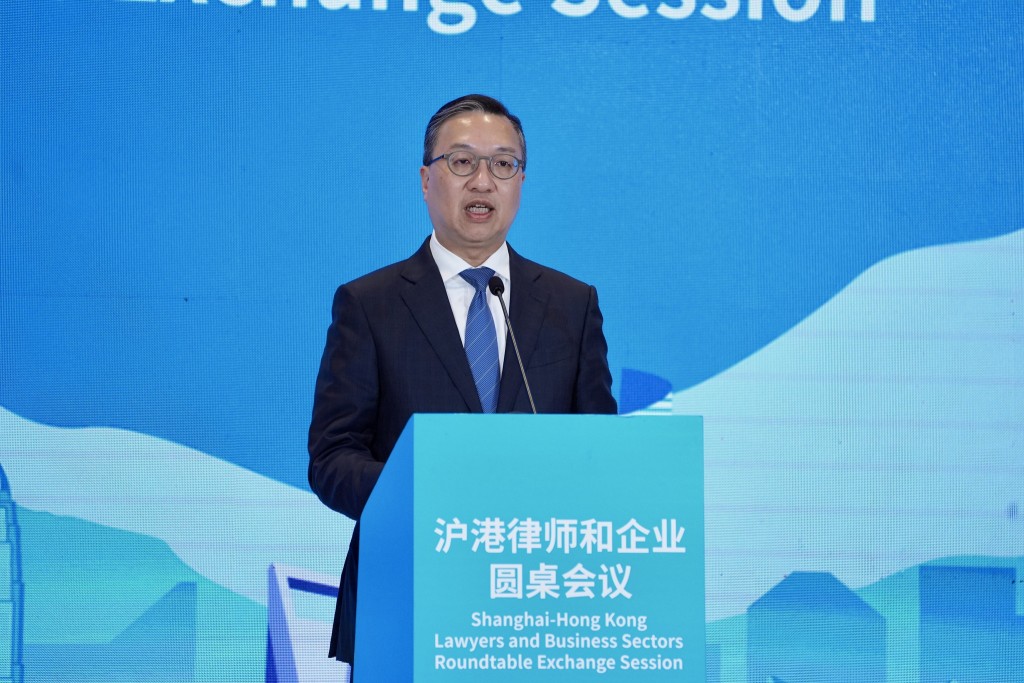 林定國致辭時表示，期望透過會議為滬港雙方搭建務實而專業的交流平台。