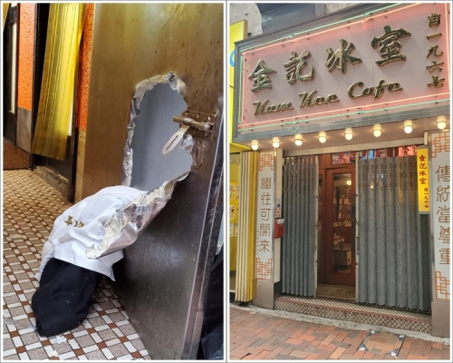 後門鐵門遭人撬開一個大洞。梁國峰攝
