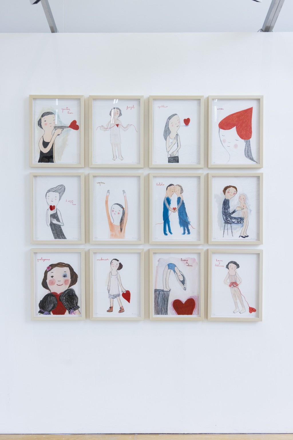 除了油畫，Eva亦有創作故事性的系列版畫，這組以紅心連繫的12幅作品，展示愛與正能量。