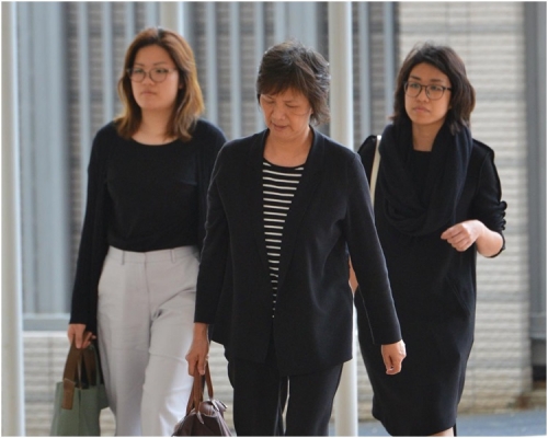 死者遺孀李少娟(中)。資料圖片