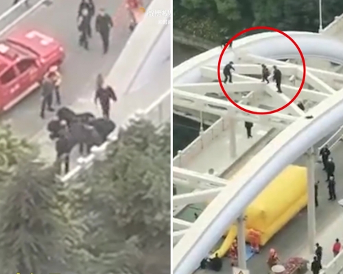 大媽爬上大橋鋼樑跳舞奔跑如履平地,救援人員前後追趕,落橋後由多名救護人員攔下。