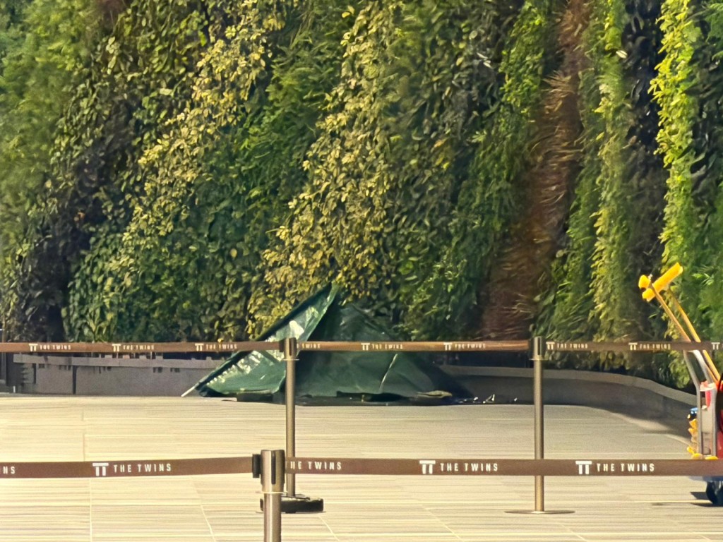 女子的身體被分開三截,死狀恐怖。曾志恒攝 女子的身體被分開三截,死狀恐怖。曾志恒攝