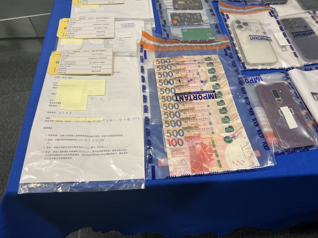 涉案文件和現金。 涉案文件和現金。