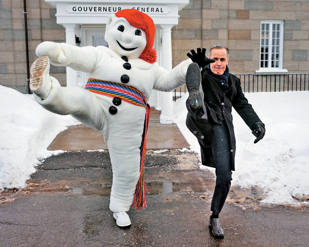 加拿大總理卡尼上周四與魁北克冬季嘉年華的吉祥物合照。