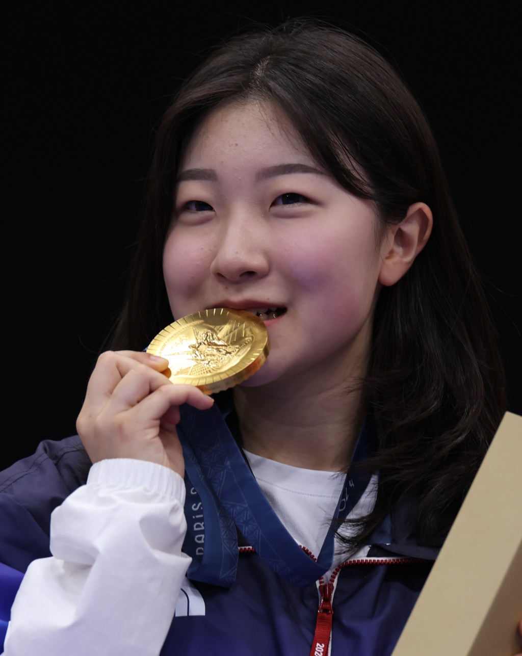 潘孝珍今年19岁，夺下奥运金牌。（新华社）
