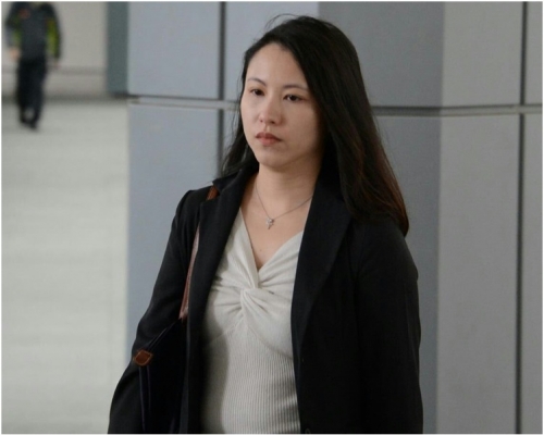 女被告麥允齡。