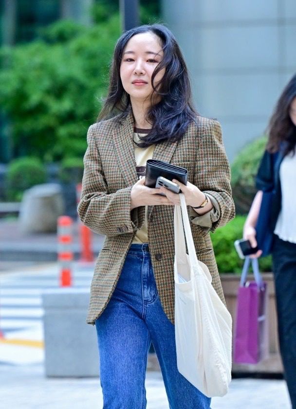 閔熙珍今透過律師開記招，否認有挖角NewJeans。