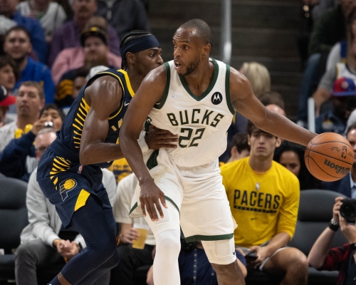 米杜顿(右)确诊新冠肺炎。Reuters