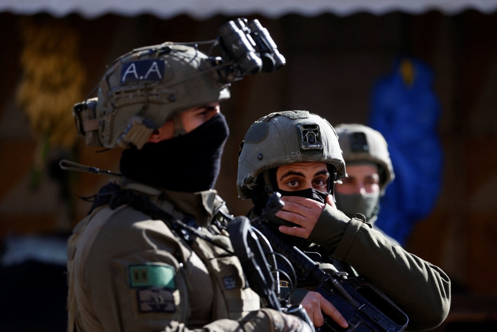 以色列國防軍加沙北部 搜索最後一具被扣押人員遺體。路透社