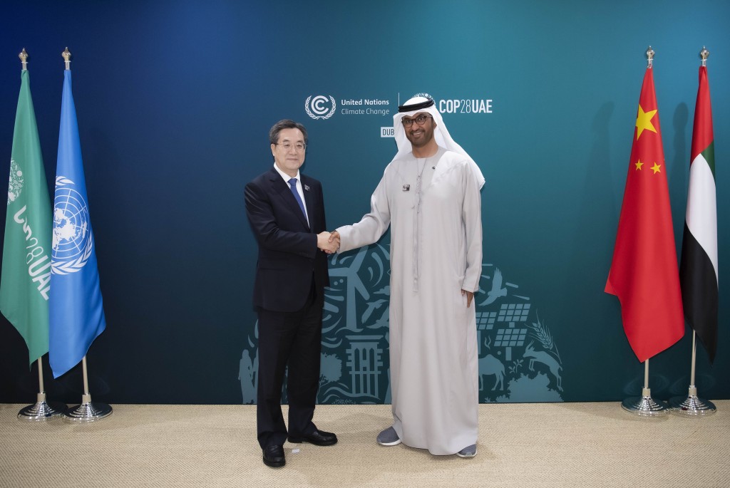 丁薛祥會見聯合國氣候變化迪拜大會主席蘇爾坦。新華社