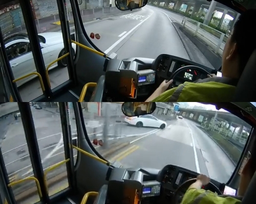 白車從小路直衝出大路。