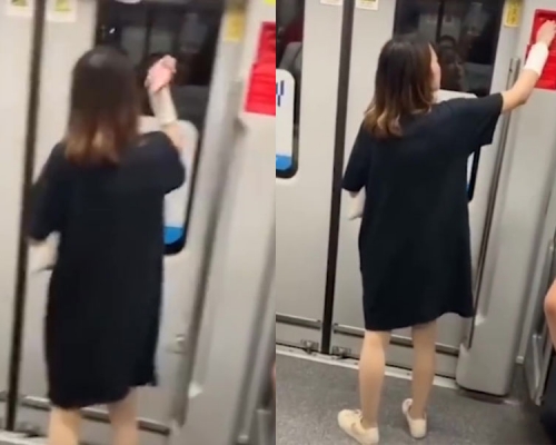 上海地鐵女乘客手機狂敲門兼拉緊急掣致車門一度出現故障。(網圖)