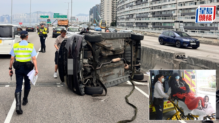 私家車與泥頭車相撞後翻側,女司機受傷由救車送院。梁國峰攝