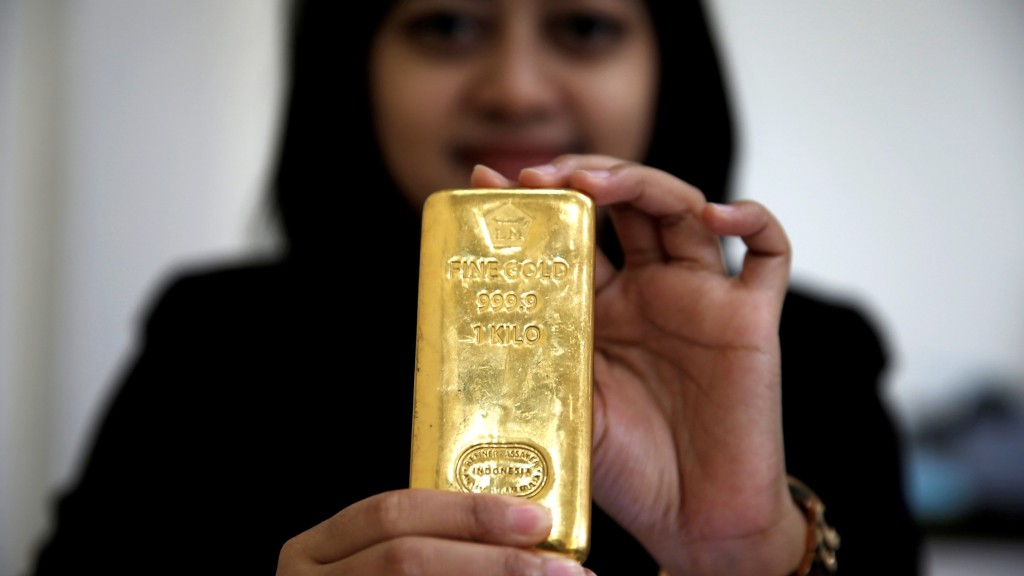 1公斤黃金的體積示意圖。 路透社