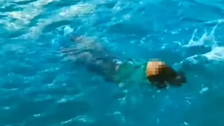 男子疑跳进嘪水池中游泳。网上影片截图