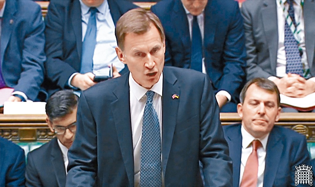 英財相侯俊偉周四在下議院公布預算案。