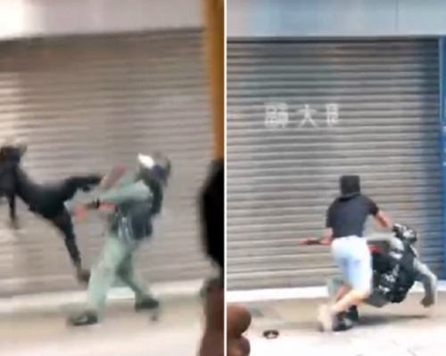 當日殆警員被示威者飛踢倒地。電視截圖