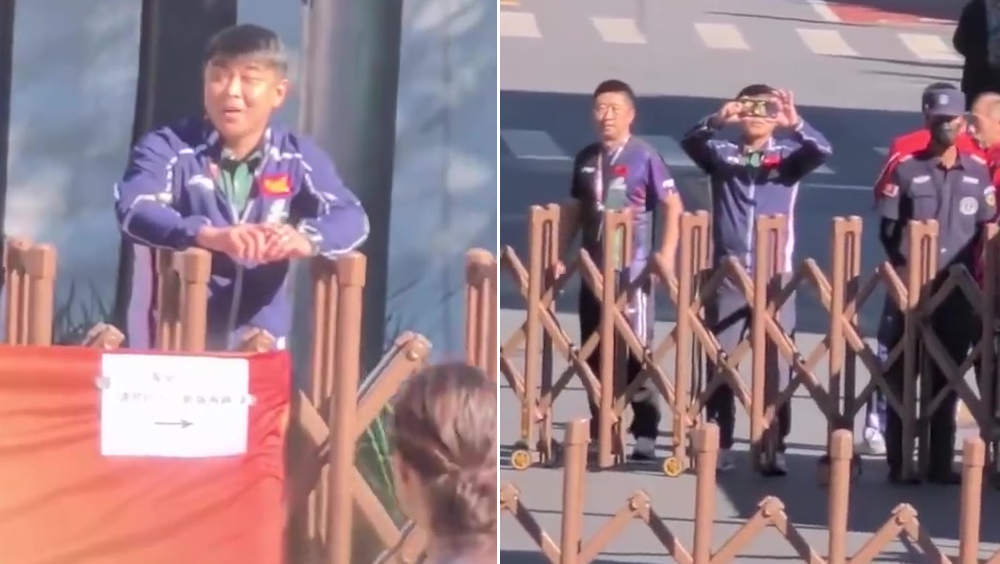 男國乒教練王皓遭極端球迷圍堵叫囂，怒舉手機報警取證。