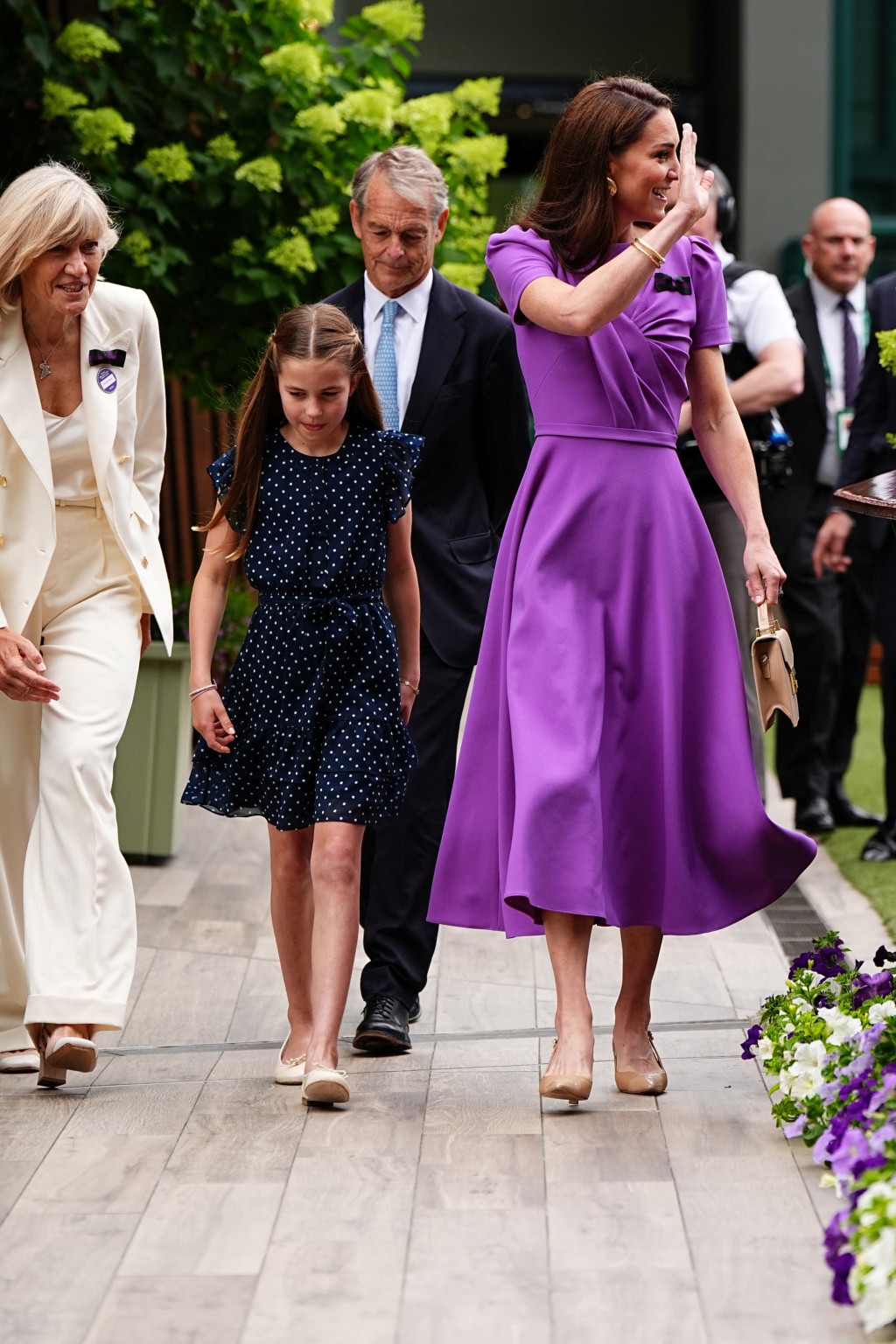 凱特身穿紫色長裙，切合溫網紫色和綠色傳統顏色。路透社