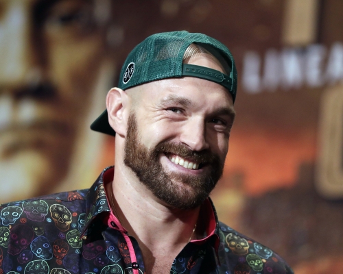 费利拥一条世界重量级拳王金腰带。AP