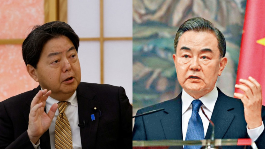 王毅與林芳正或在慕安會短暫交談。美聯社/新華社