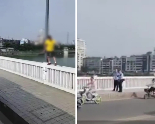丈夫殺妻後一度持刀爬上大橋護欄，警員在不遠處戒備。網圖