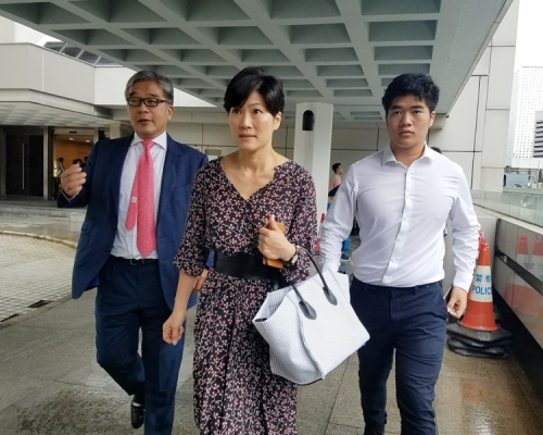 陈禹嘉、陈的妻子李淑慧及两人的儿子。黄梓生摄