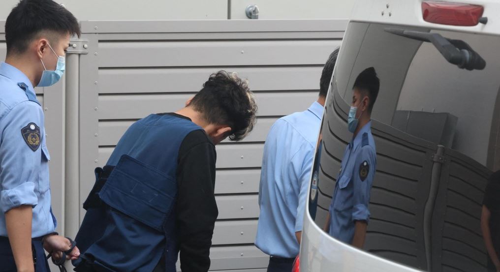 谷本將志閃避鏡頭。法新社