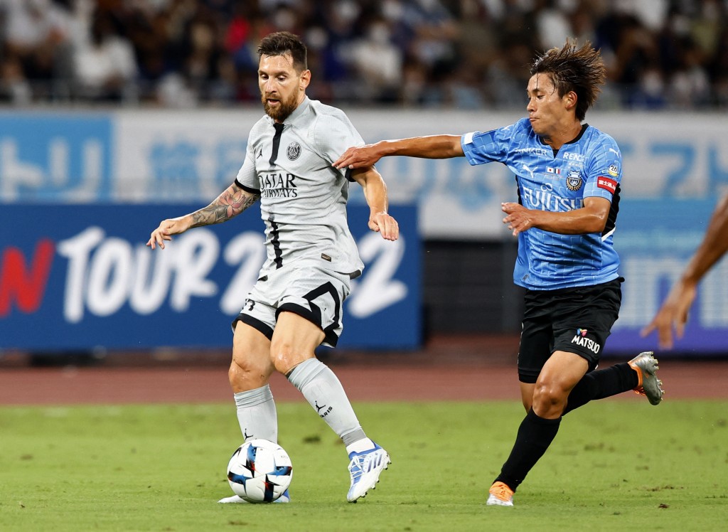 美斯(左)认为日本球员的对抗能力已达世界级。Reuters