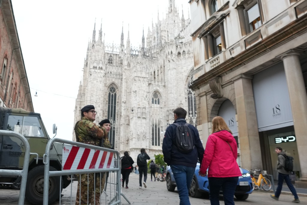 米蘭街頭有軍警戒備。美聯社