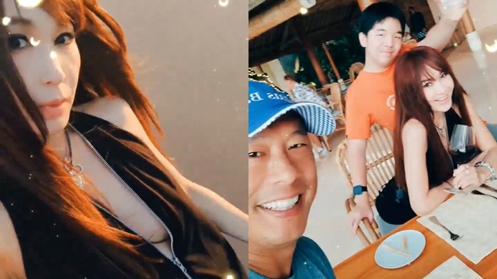 溫碧霞拉低拉鏈真空露半球,一家三口睇日落享美好時光。
