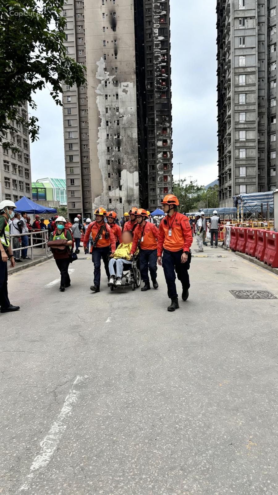 當居民上樓時感到不適，各政府部門共同協作安排送院治理。